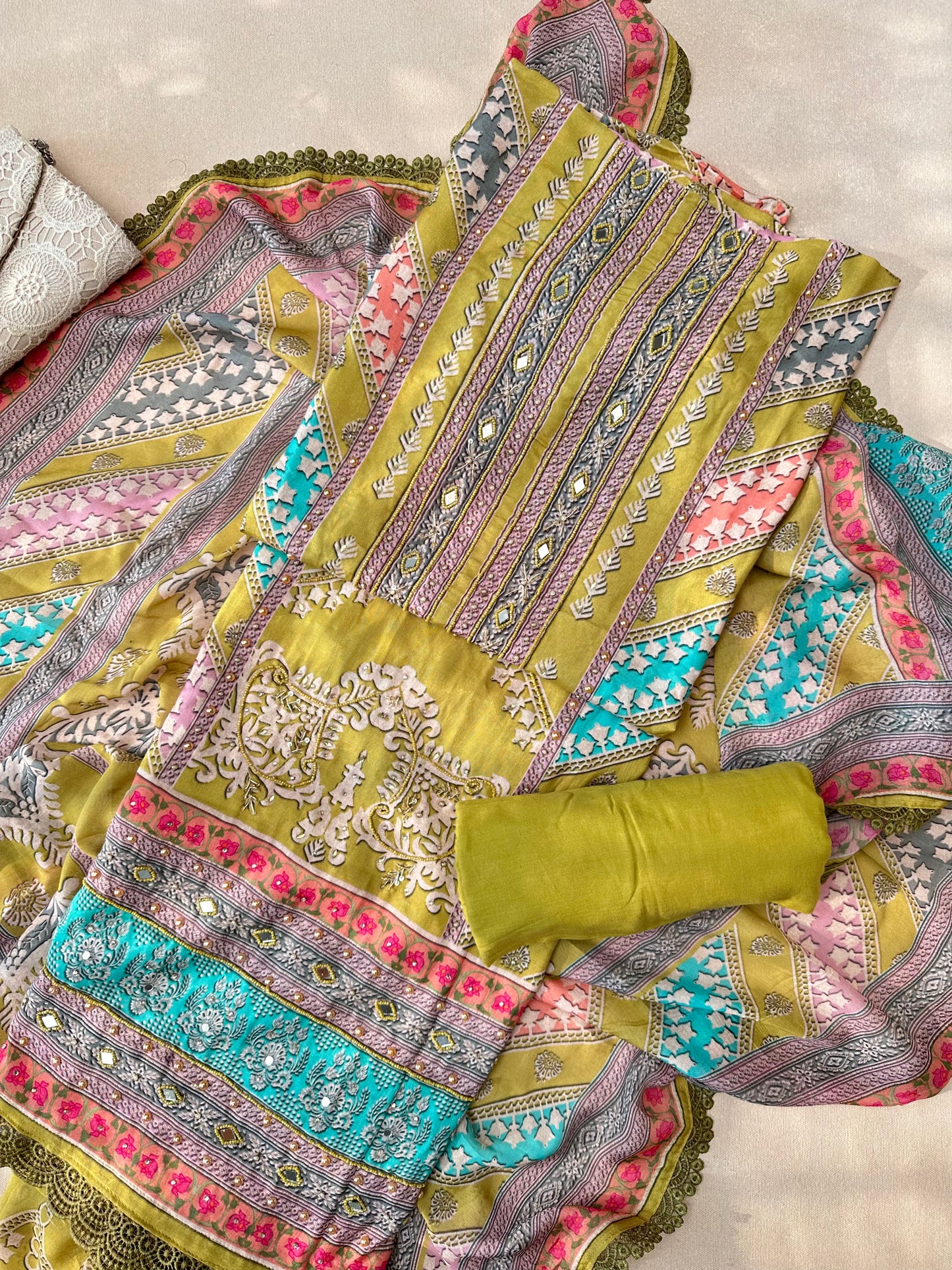 Multicolour Pure Muslin Pakistani Suit with Beadwork